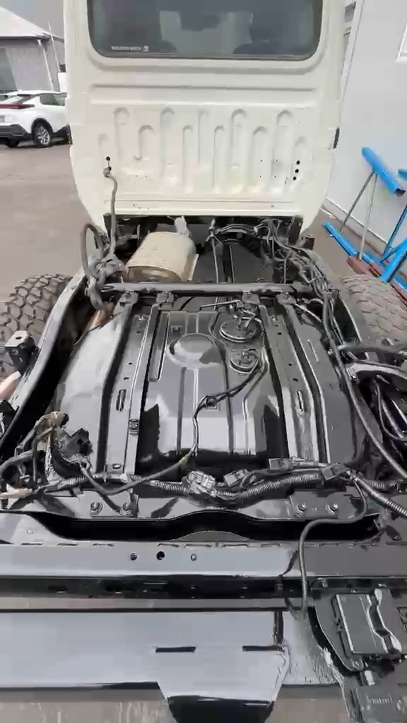 Gloss black chassis, cross members and fuel tank on an ex-mine LandCruiser after dry ice blasting and IGL coating